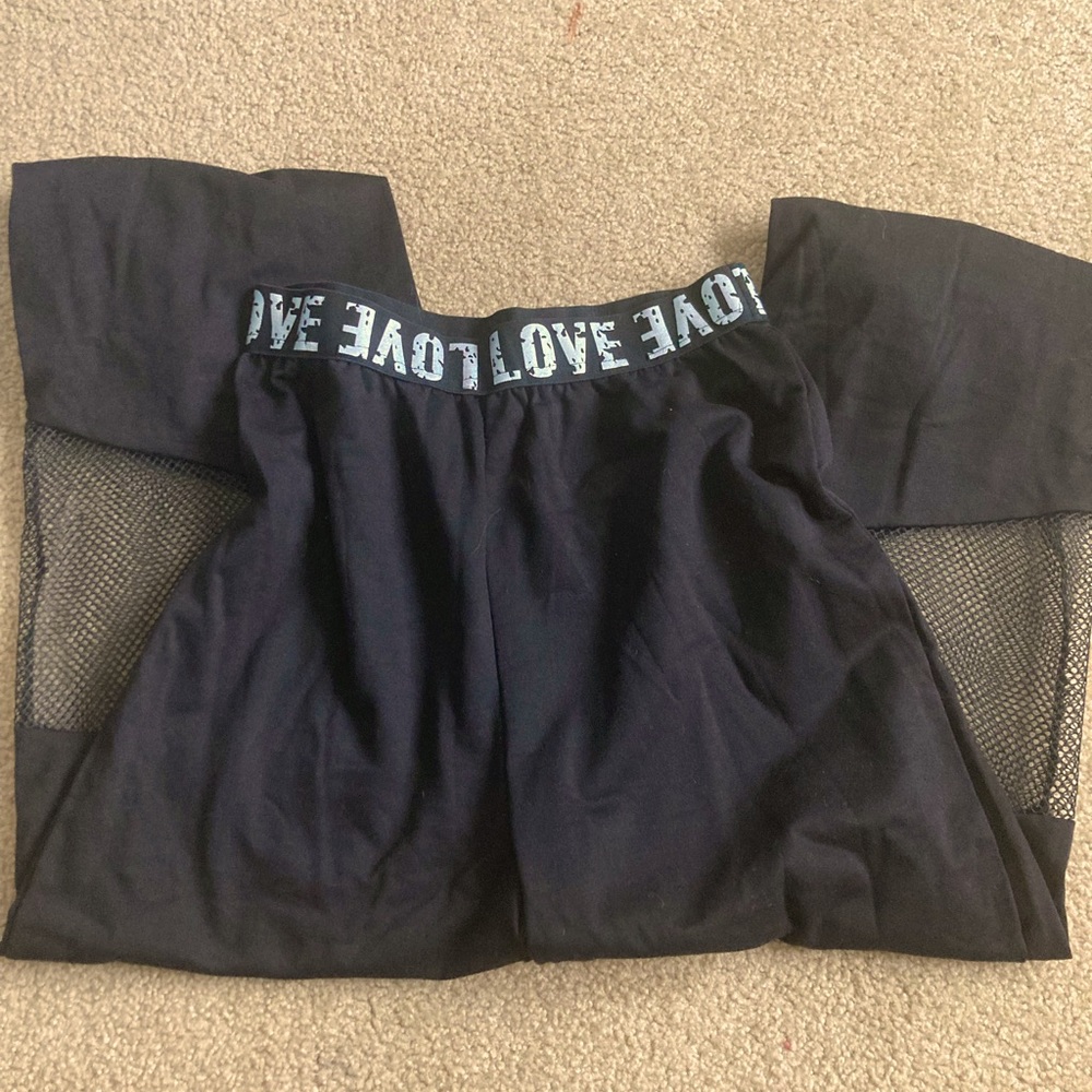 Black sweatpants, mesh knees